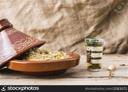 quinoa salad near cup table