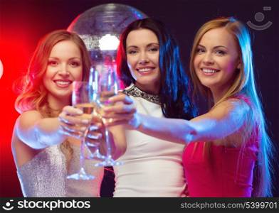 &quot;new year&quot;, celebration, friends, bachelorette party, birthday concept - three beautiful woman in evening dresses with champagne glasses