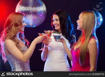 &quot;new year&quot;, celebration, friends, bachelorette party, birthday concept - three women in evening dresses with cocktails and disco ball