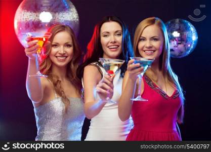 &quot;new year&quot;, celebration, friends, bachelorette party, birthday concept - three women in evening dresses with cocktails and disco ball