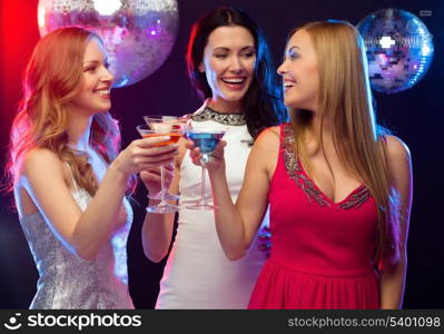 &quot;new year&quot;, celebration, friends, bachelorette party, birthday concept - three women in evening dresses with cocktails and disco ball