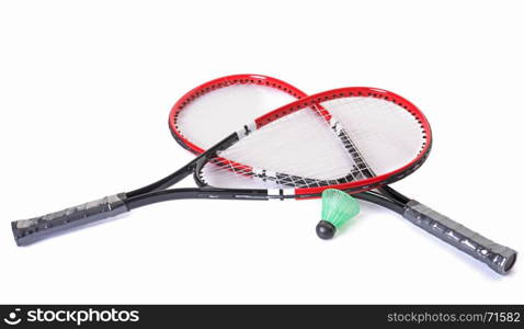 racket and shuttlecock of badmintonin studio