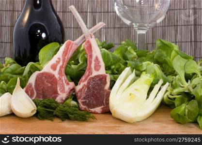 Racks of lamb. a ready to cook food composition with rack of lambs and other ingredients