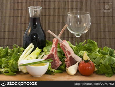 Racks of lamb. a ready to cook food composition with rack of lambs and other ingredients