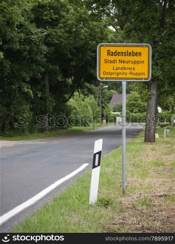 Radensleben-Ortseingang. Radensleben is located along Route 164 (L164) between Wustrau and Herzberg north-west of Berlin. The place belongs since 1993 to Neuruppin - city limit
