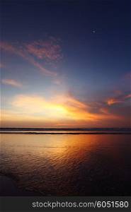Radiant sea beach sunset on Bali. Radiant sea beach sunset
