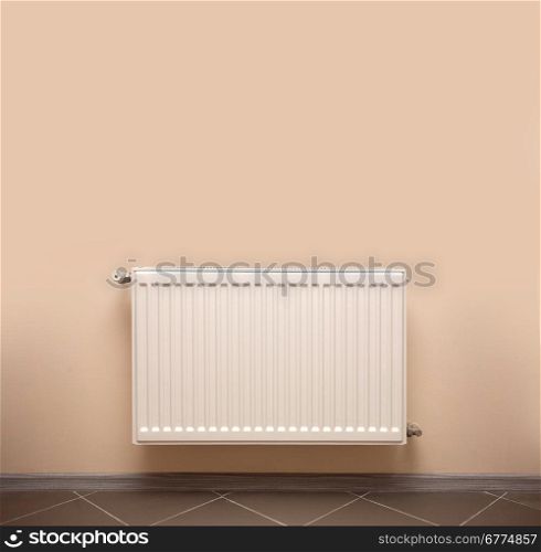 radiator on a light beige wall