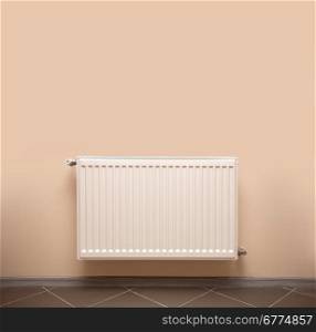 radiator on a light beige wall