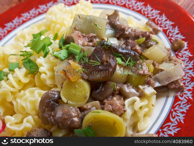 Radiatori - Pasta italian cuisine with beef and mushrooms