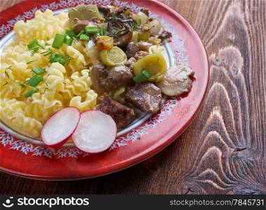 Radiatori - Pasta italian cuisine with beef and mushrooms
