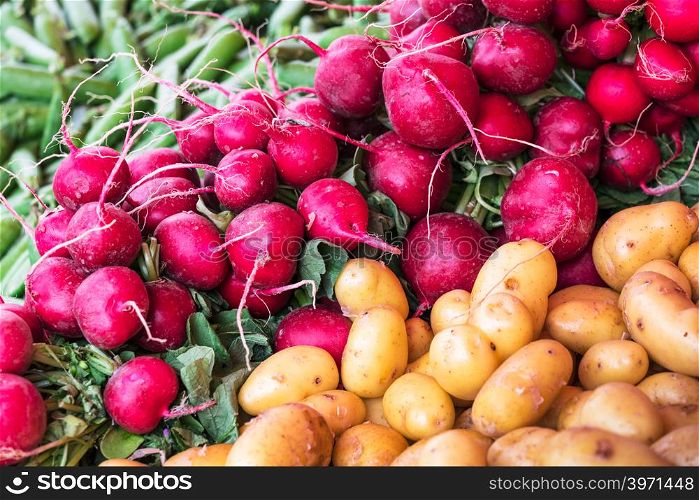 radish and potatoes on the market