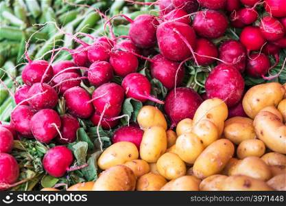 radish and potatoes on the market