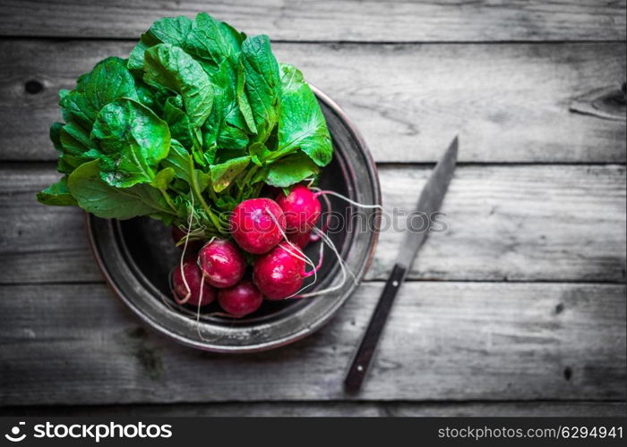 Radish on wooden background