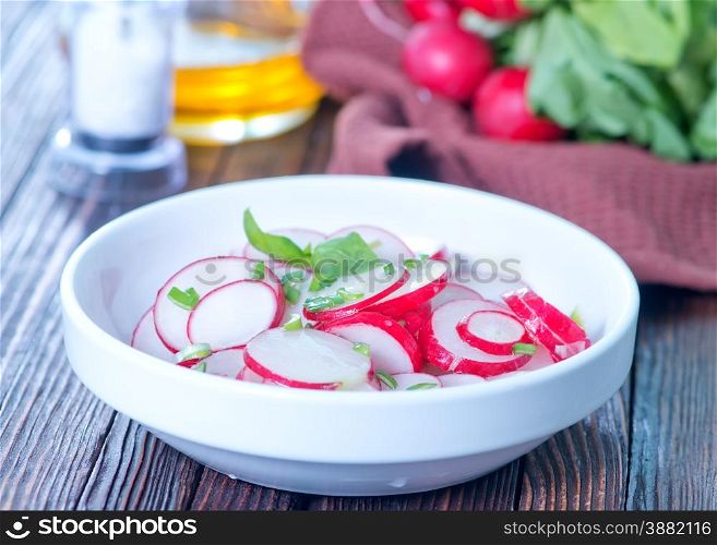 radish salad on plate and on a table
