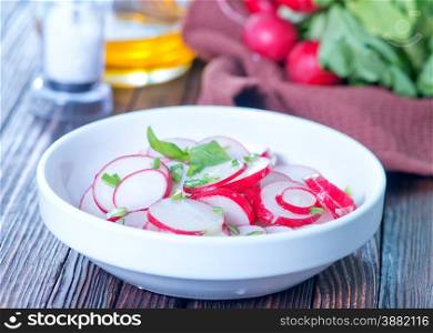 radish salad on plate and on a table