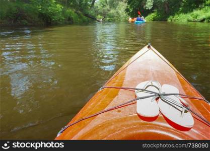 rafting on the river by kayak, tourists raft on canoe. tourists to raft on a canoe, rafting on a kayak