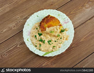 Ragda patties - popular Indian fast food or snack street food of Mumbai.dried yellow pea soup and patties, a fried potato cutlet.