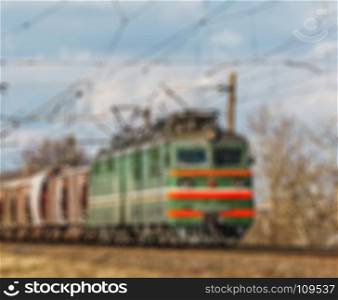 Rail freight. Creative story with a blurry background and bokeh elements.