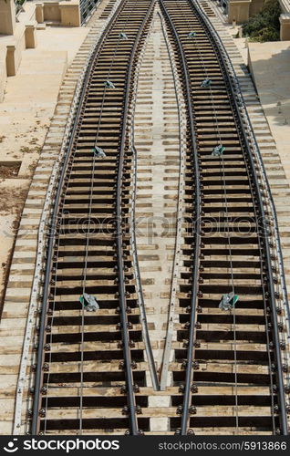 Rail tracks in bright summer day