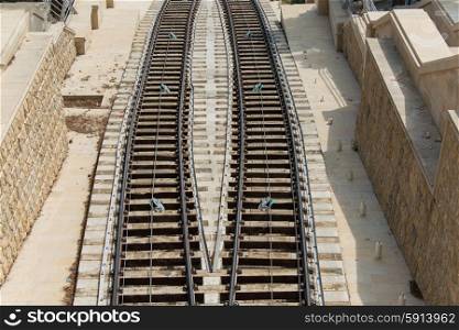 Rail tracks in bright summer day