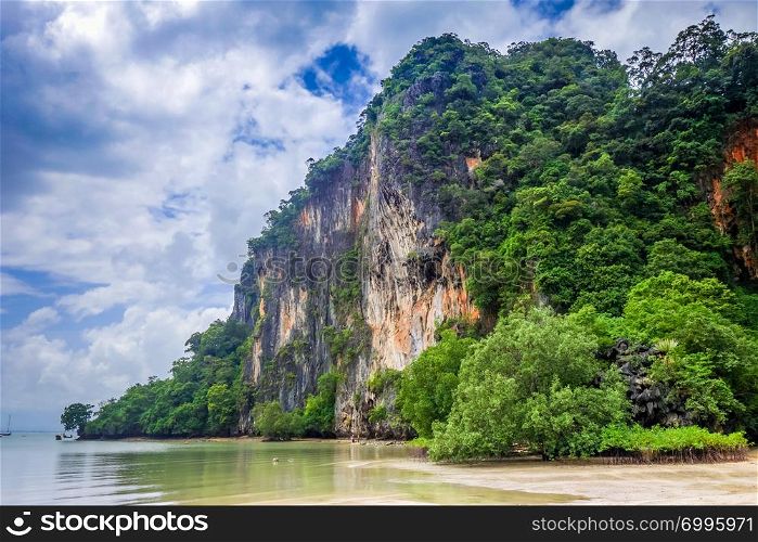 Railay beach, limestone cliffs and mangrove, Krabi, Thailand. Railay beach in Krabi, Thailand