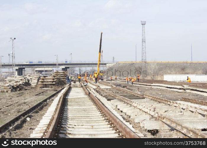 Railroad metal train tracks shot at perspective view.