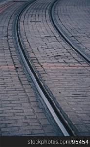 railroad tracks in the station in the street