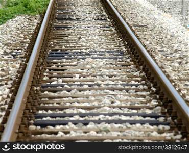 railroad tracks leading zo an infinite distance