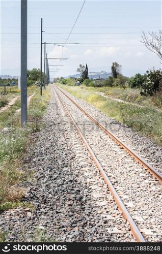 railroad tracks pylons countryside. Binary to infinity