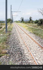 railroad tracks pylons countryside. Binary to infinity