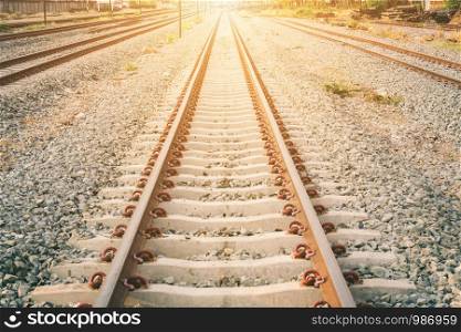 Railroad tracks. with sun rays background.