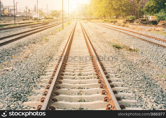 Railroad tracks. with sun rays background.