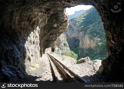 Railway and tunnel in gorge near Diakopto, Greece