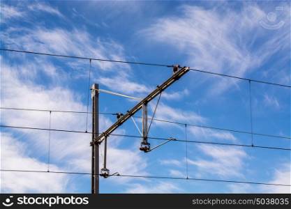 railway cable tracks against hazy blue sky