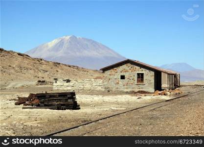 Railway in the stone desert and mountain near Uyuni in Bolivia