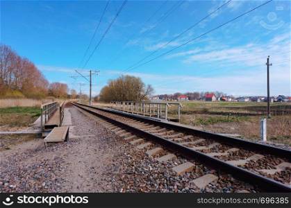 railway stretching into the distance, rails in three rows. rails in three rows, railway stretching into the distance