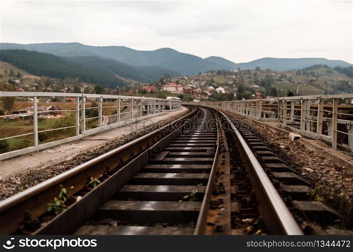 railway track in the Carpathian Mountains. railway sleepers.. railway track in the Carpathian Mountains. railway sleepers