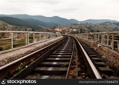 railway track in the Carpathian Mountains. railway sleepers.. railway track in the Carpathian Mountains. railway sleepers