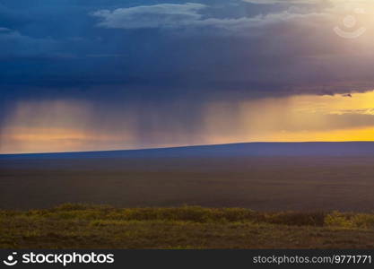 Rain at sunset in polar tundra