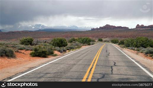 Rain clouds come over the mountains in the Utah desert