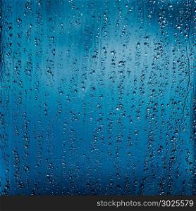 rain on glass. Rain drops on window