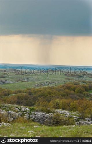 Rain on the horizon. Ukraine, Crimea, Karabi plateau.