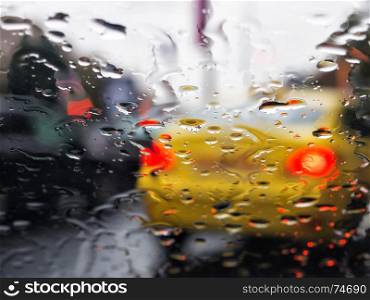 Rain on windshield of car seen from inside car