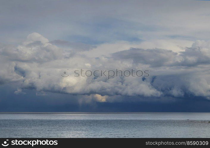 rain weather above sea beach