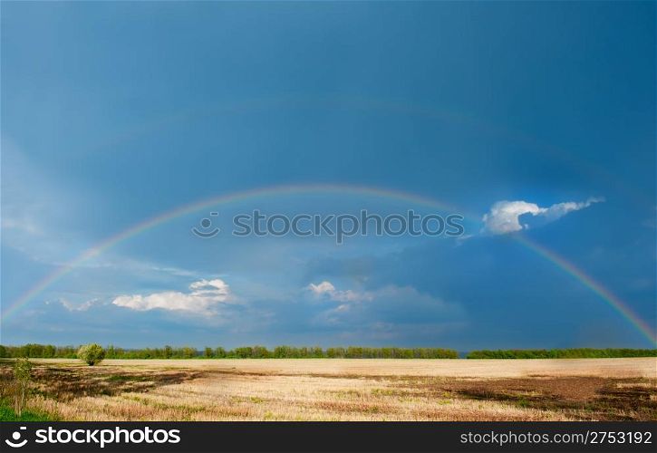 Rainbow. A landscape with a rain and a rainbow.