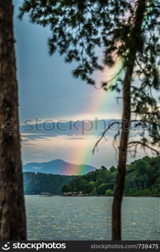 rainbow after thunderstorm at lake jocassee south carolina