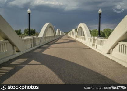 Rainbow arch bridge over South Platte River in Fort Morgan, Colorado