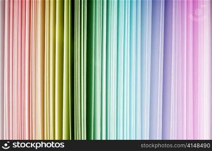 Rainbow color spectrum of thick paper ends, from red to purple