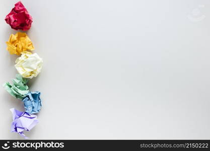 rainbow made six colored crumpled paper balls