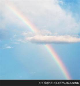 Rainbow on cloud and blue sky for background